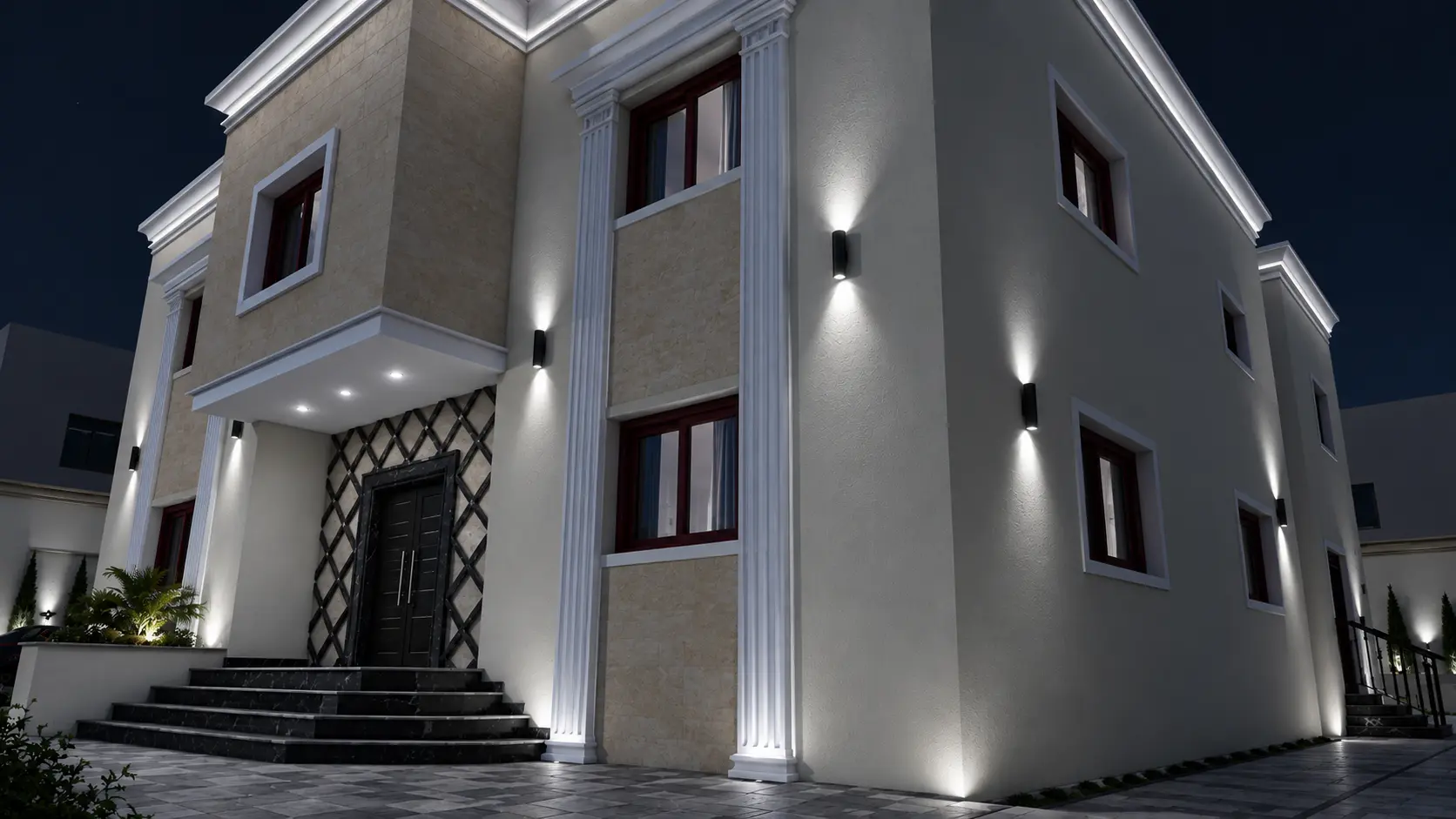 مدخل فيلا كلاسيكي معاصر بكسوات فاتحة تصميم مدخل فيلا كلاسيكي معاصر بأعمدة وحليات بيضاء وكسوة حجرية بيج ودرج داكن مع إضاءة جدارية ليلية